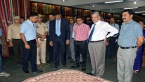 RBI Governor, Raghuram G Rajan along with Chairman, J&K Bank, Mushtaq Ahmad, during a visit to an industrial unit at Bari Brahmana.