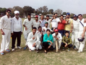 Murtaza Warriors team posing for a group photograph after clinching victory in J&K Premier League T20 Cricket Tournament on Tuesday.