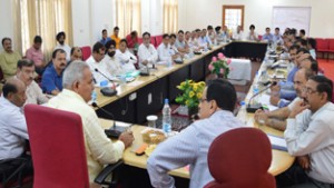 Minister for PHE, Sham Lal Choudhary chairing a meeting at Jammu on Thursday.