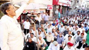 Low paid employees leader Ab. Majid Khan addressing May Day rally in Jammu on Saturday. -Excelsior/Rakesh