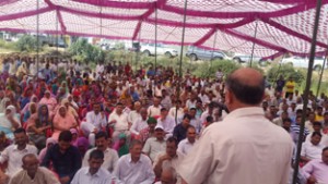 Former DyCM Tara Chand addressing public rally at Narayana in Khour on Sunday.