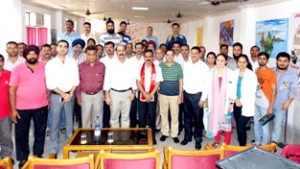 Participants of First Aid Training programme along with trainers and other guests, posing for a group photograph.