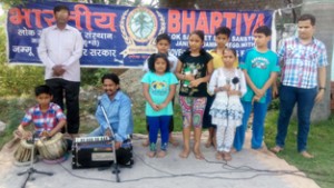 Artists of BLSKS presenting musical play.