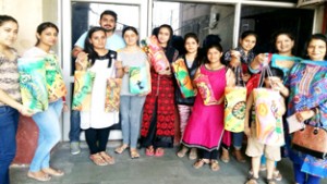 Students displaying items prepared by them during workshop on creative ideas by NIFD at Jammu.