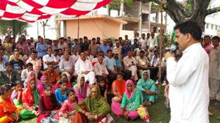 JKNPP chairman, Harshdev Singh, addressing gathering in Ramnagar constituency.