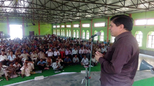 SoS International leader Rajiv Chuni addressing PoK refugees at Sunderbani on Sunday.