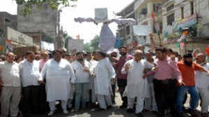 Congress activists taking out protest rally in Jammu on Friday. -Excelsior/ Rakesh 