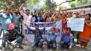 Temporary teachers protesting in support of their demands on Friday. -Excelsior/ Rakesh