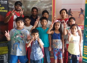 Winners of swimming contest posing for group photograph. 