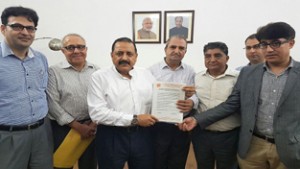 Union Minister Dr Jitendra Singh receiving a memorandum from a delegation of Kashmiri Pandits who called on him at North Block, New Delhi on Monday.