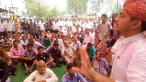 MLA Ramnagar RS Pathania addressing a public gathering.