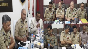 DGP K Rajindera Kumar chairing a meeting at Jammu on Friday.