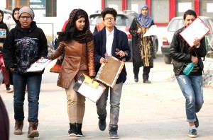 Students after appearing in Class 10th examination in Srinagar on Tuesday. -Excelsior/Shakeel