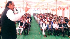 Senior NC leader SS Slathia addressing public meeting in Vijaypur area on Thursday.