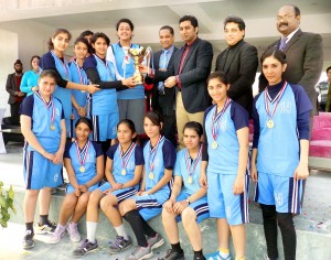 Winners of Basketball Tournament posing alongwith chief guest and other dignitaries at Banyan International School.