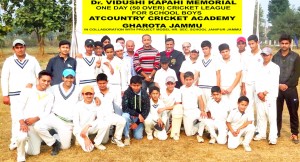 Young cricketers posing alongwith chief guest and other dignitaries at Country Cricket Academy ground at Gharota in Jammu.