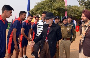 Minister for Education Naeem Akhtar interacting with players after inaugurating Volleyball Tournament at HSS Sunjwan in Jammu.