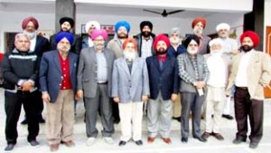 Punjabi writers posing for a photograph in a literary meet organised on Sunday.