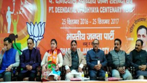 Deputy CM, Dr Nirmal Singh and BJP State President Sat Sharma at a workshop organised by Party’s Mahila Morcha at Jammu on Saturday.