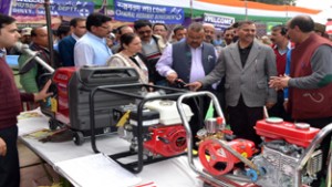 Minister for Industries and Commerce, Chander Parkash Ganga inspecting a stall at Kissan Mela at Samba on Saturday.