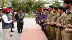 NCC Cadets interacting with decorated soldier capt (Rtd) Bana Singh (PVC) and ADG, Maj Gen Nilendra Kumar at Nagrota on Thursday.