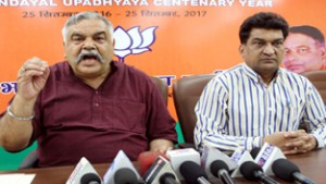 BJP spokespersons Brig (Retd) Anil Gupta and Balbir Ram Ratan at a press conference at Jammu on Tuesday.