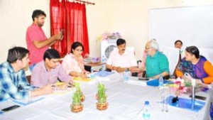 JU VC alongwith MLA Pawan Gupta interacting with faculty and officials at Udhampur Campus on Friday.