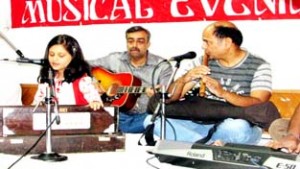 An artist presenting a song during cultural programme at K L Saigal Hall, Jammu on Friday.