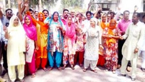 People protesting against power failure in Vijaypur village on Friday.