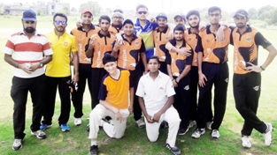 Players of Patel Cricket Club posing for a group photograph after defeating Provin Cricket Club in Jammu on Sunday.