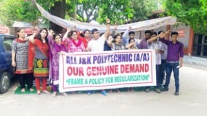 Academic arrangement staff raising slogans during protest on Monday.