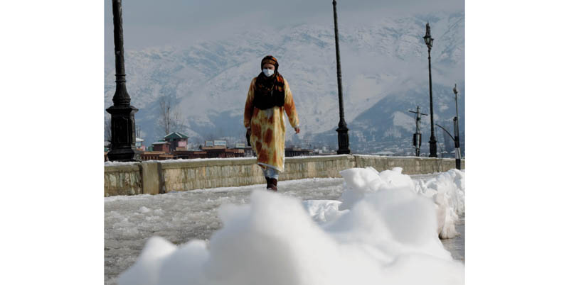 Srinagar experiences season’s first snowfall on Saturday. (UNI)