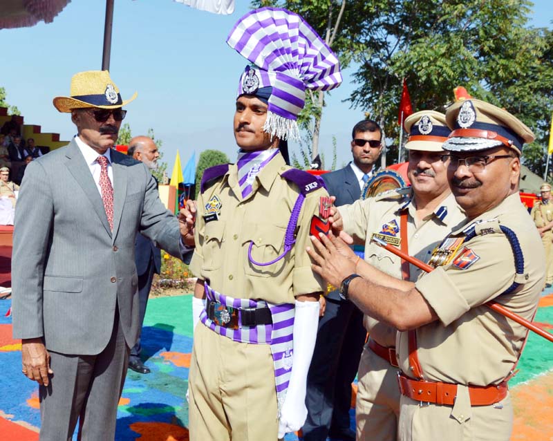 Advisor Vijay Kumar Decorating Best Performing Trainee During Attestation Cum Passing Out Parade