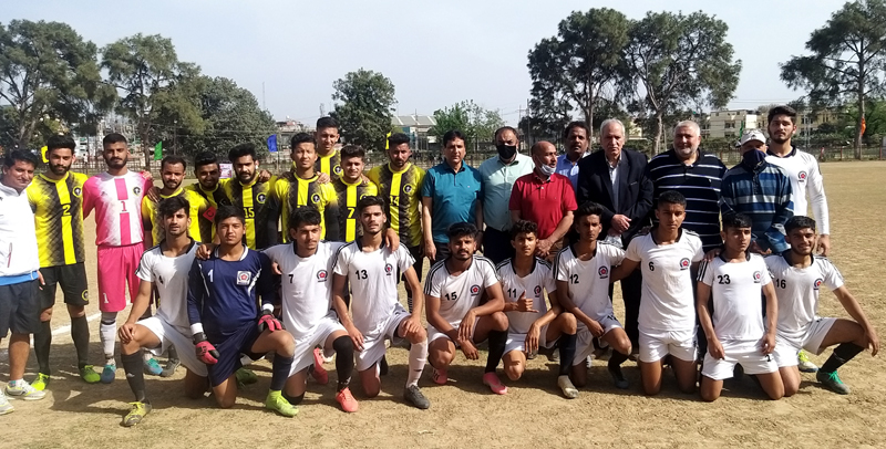 Winning team posing for a group photograph with dignitaries at GGM ...