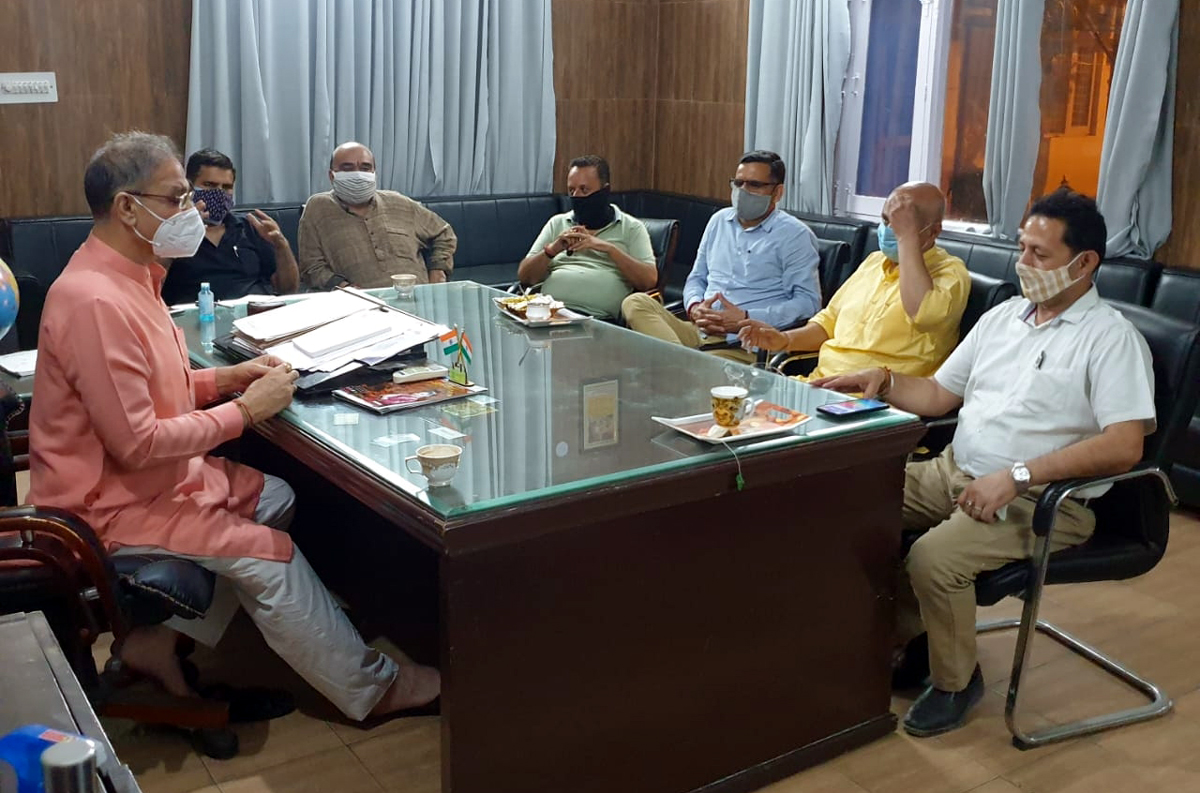 Former Deputy CM Kavinder Gupta chairing a meeting of ...